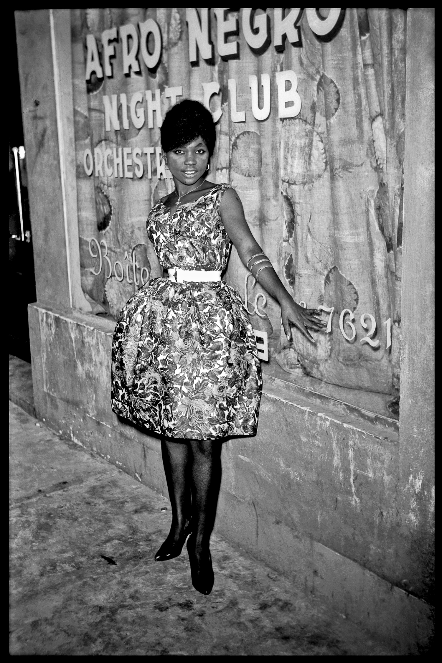 © photo Jean Depara, 'Young Woman in Front of Afro Negro Club', Kinshasa, D.R.Congo ca. 1955-1965
